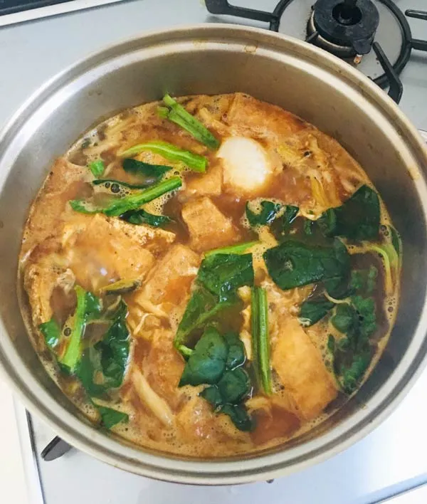 鍋の残りで月見カレーうどん